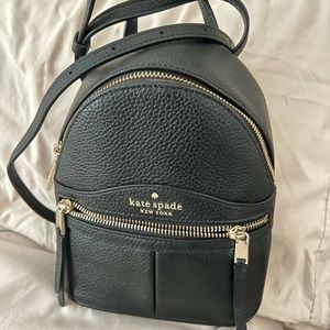 Kate spade small leather back ok.